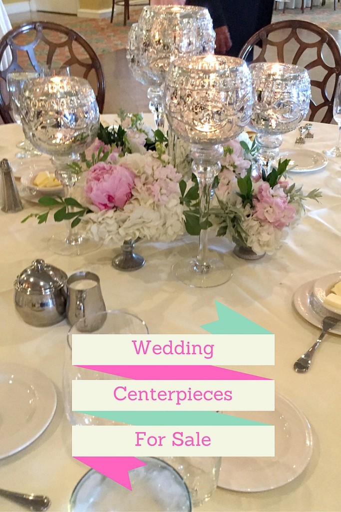 Wedding centerpiece with mercury glass goblets with votive candles and small footed containers with blush and pink peopnies, roses and hydrangeas. Goblets for sale at Vintage American HOme.